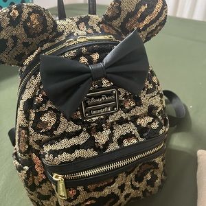 Cheetah print Animal Kingdom Disney Loungefly